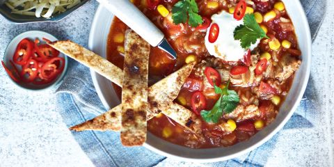 Chicken enchilada soup with crispy tortillas