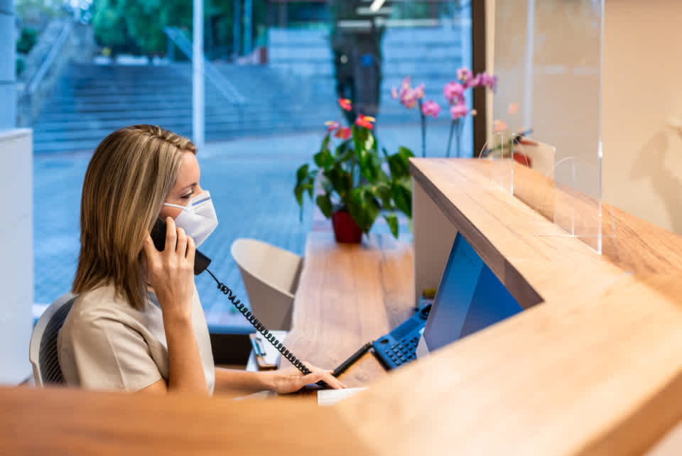 Receptionist sitting at the desk.jpg