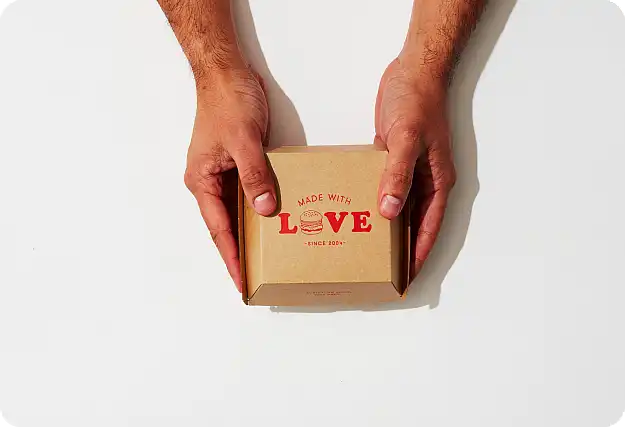 Burger box with 'Made with Love' stamped on the lid.