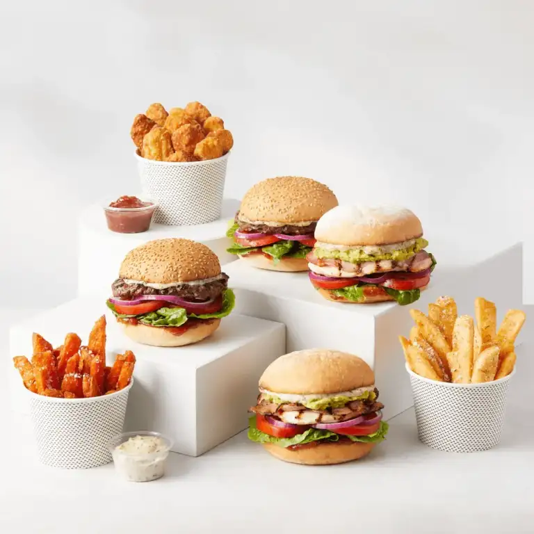 Grill'd Famished Family Bundle - family meal deal with four burgers, famous Grill'd chips, sweet potato chips, and Healthy Fried Chicken bites