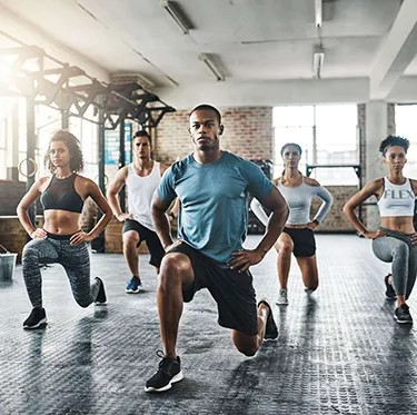 Certified Personal Training class doing lunges