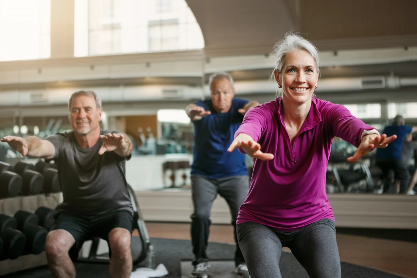 Senior adult male with yoga mat