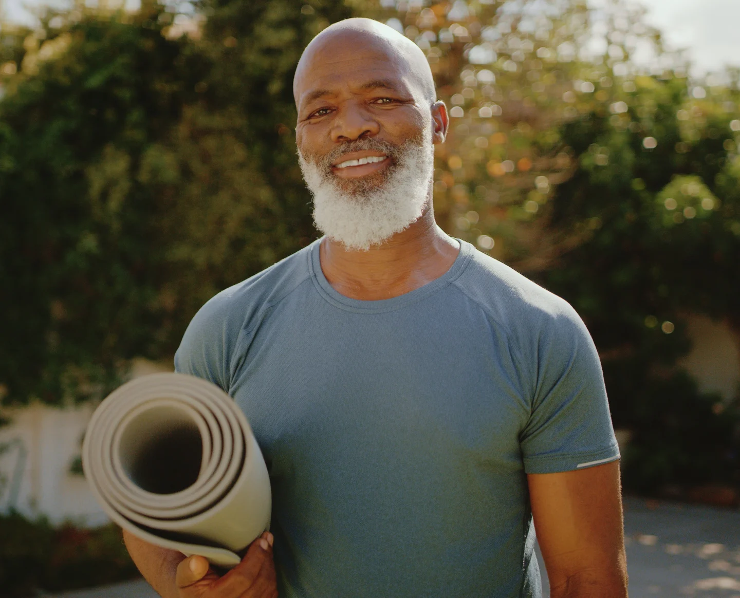 Older Man With Yoga Mat