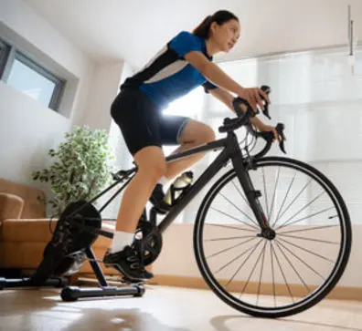 Indoor Cycling Instructor teaching a virtual class