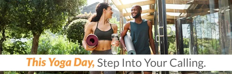 ISSA trainer and client doing yoga on yoga mat