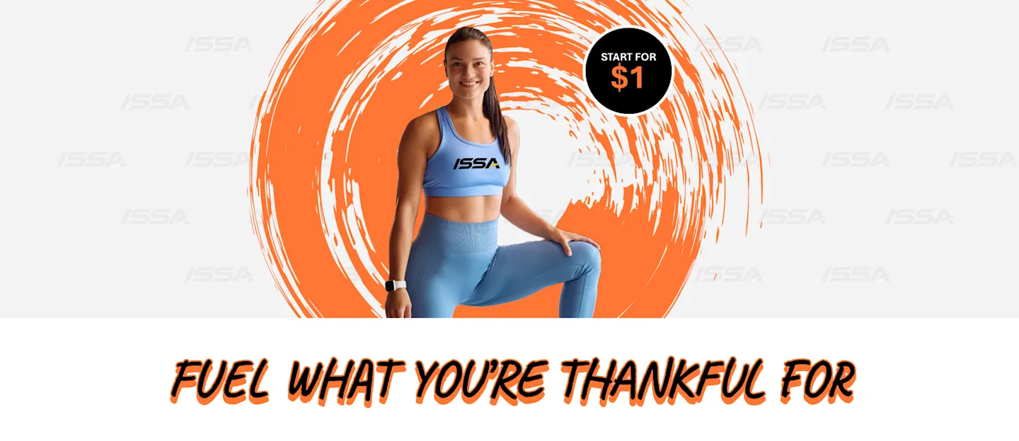 ISSA trainer and client doing yoga on yoga mat