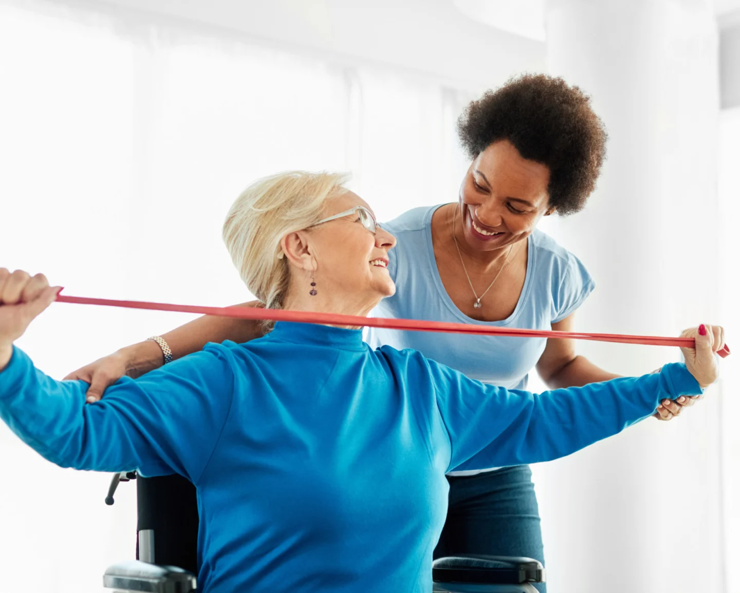 Elderly lady with ISSA Trainer for anchor point training