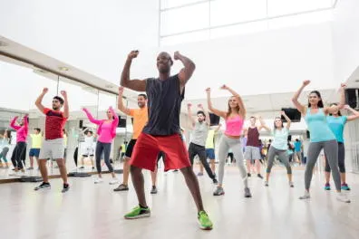 Group of trainers dancing