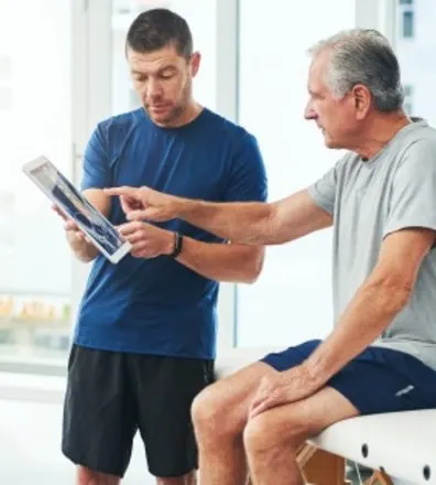 Man holding his side indicating pain