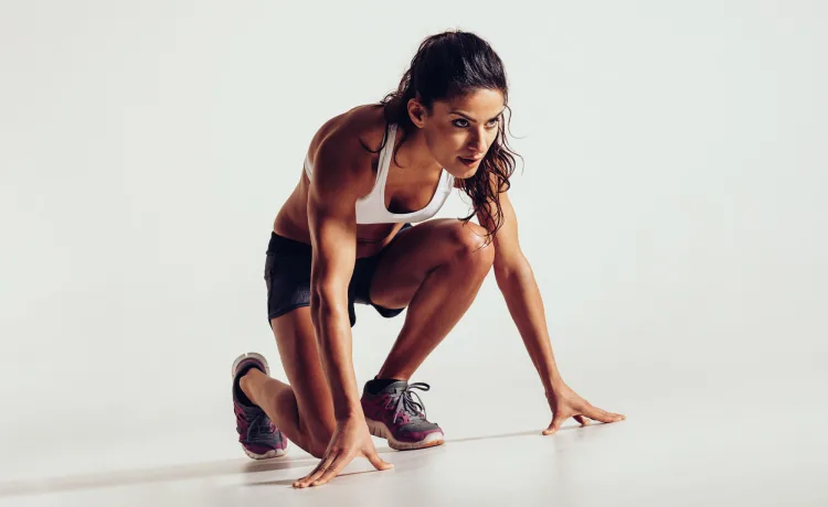 Woman preparing to run Performance Enhancement ISSA Trainer