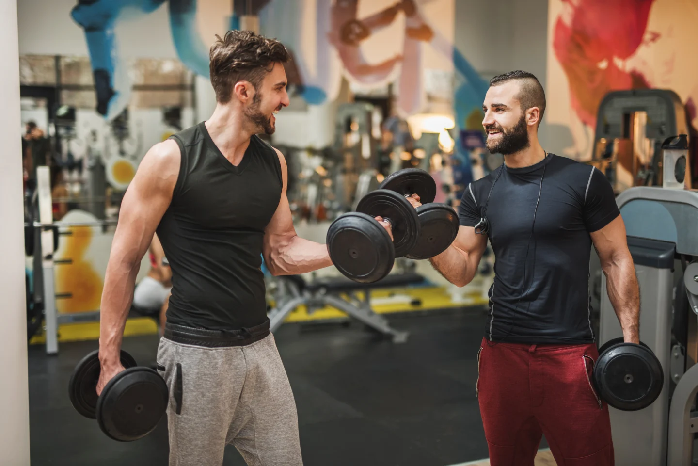 Elite Trainers doing dumbbell curls