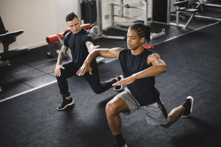 ISSA trainer and client stretching