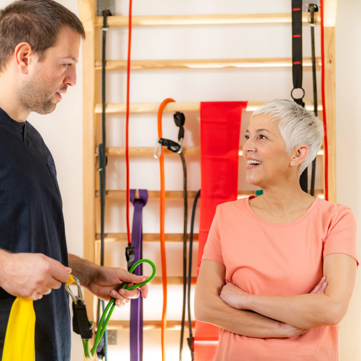 Elderly lady with ISSA Trainer for anchor point training