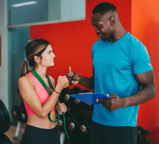 Trainers Doing Fist Bump Stock Photo