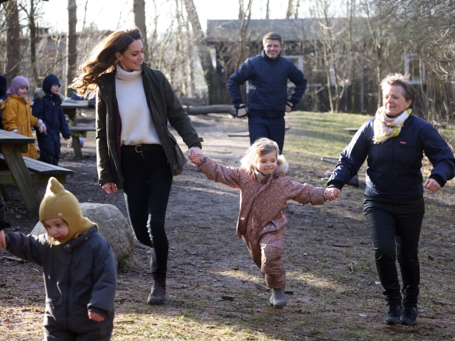 The Duchess of Cambridge plays with children at the Stenurten Forest Kindergarten