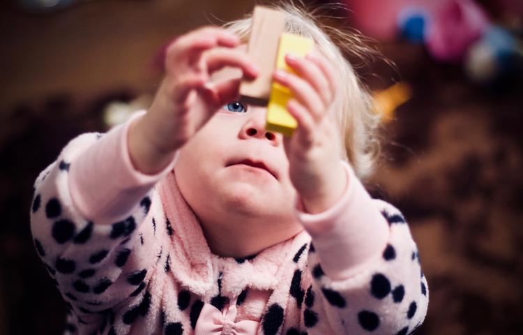 A child playing with building blocks