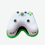 Een heerlijke taart in de vorm van een Xbox controller. Xbox controller taart