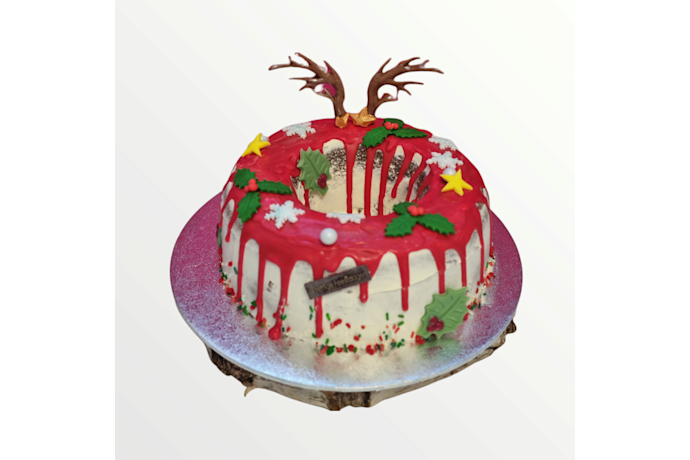 Een royale kerst krans taart met decoratie van chocolade, creme en fondant. kerst krans taart