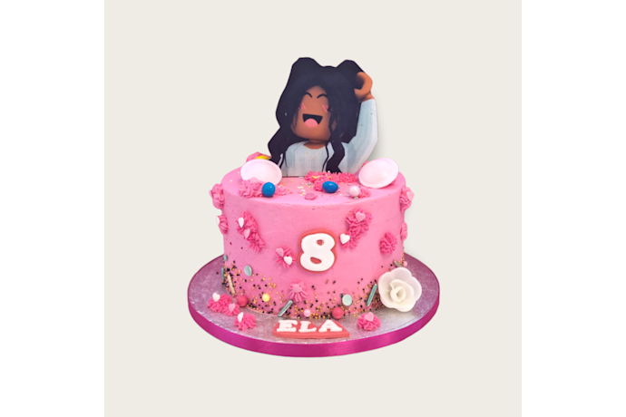 Heerlijk hysterisch roze taart met Roblox karakter erop. Roblox taart