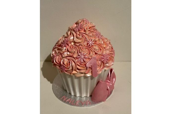 Roze smash met strik en bloemen