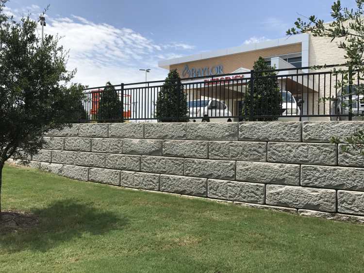 Superior Concrete Products Fence and Wall Projects Gallery - ReCon™️ Retaining Wall With Fence Top