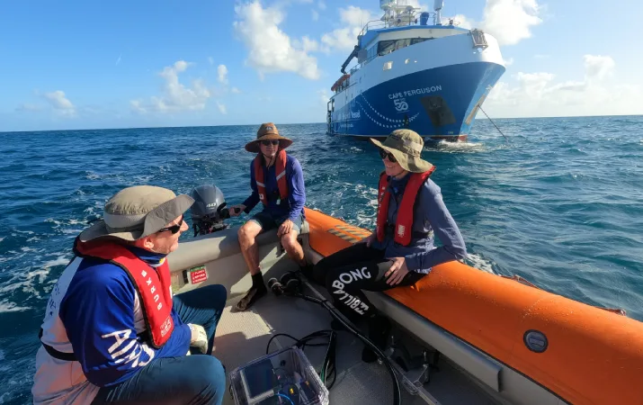 De'vereux Harvey and two of her crew on a raft heading away from the research vessel RV Cape Ferguson