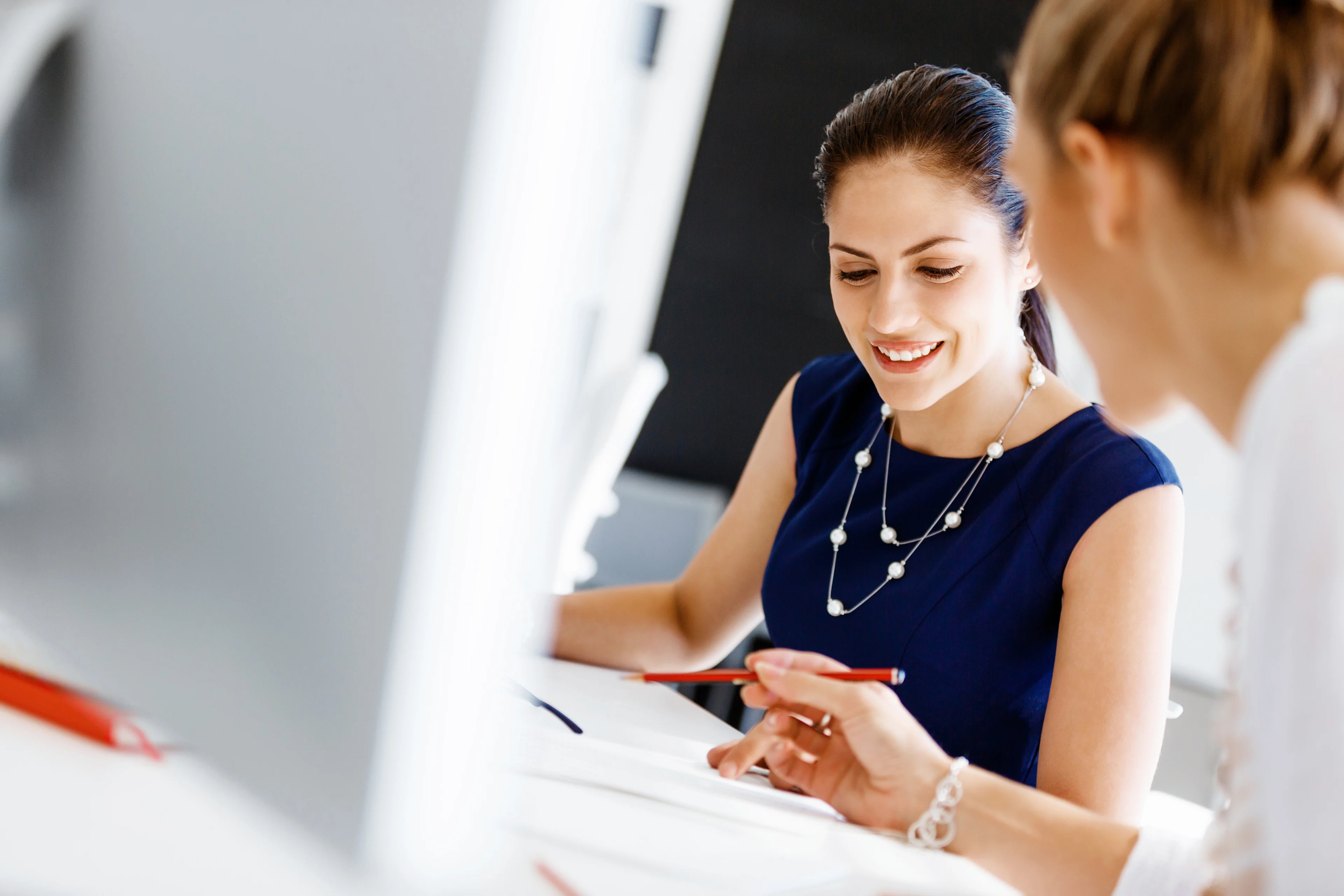 Two female colleagues working together