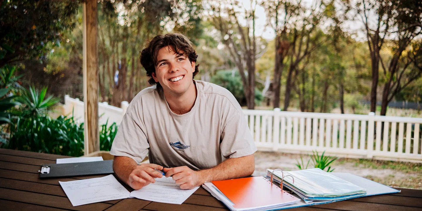 Student studying at his regional property