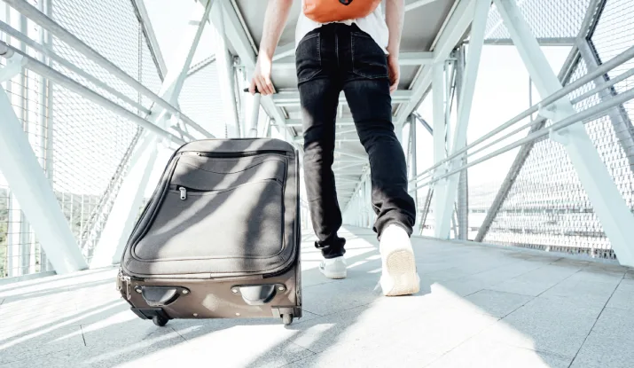 A teacher heading off on holidays at the airport