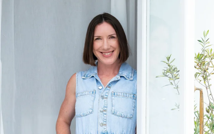 Friendly brunette woman smiling