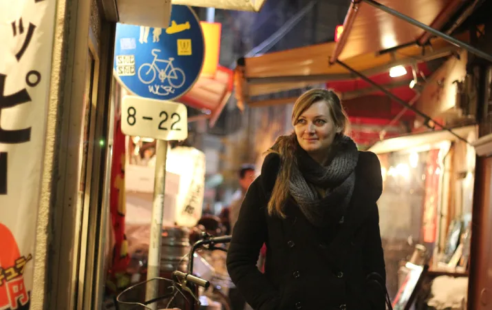 Celia Polkinghorne walking through Tenma, a colourful neighbourhood of Osaka