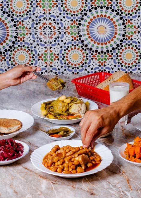 Frakesh slow-cooked beans and beef with beetroot and carrot salads and khobz bread