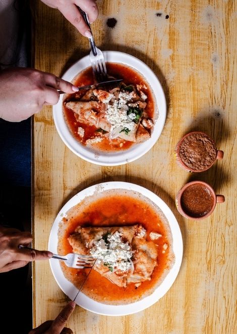 Entomatada, tortilla with Oaxacan tomato sauce