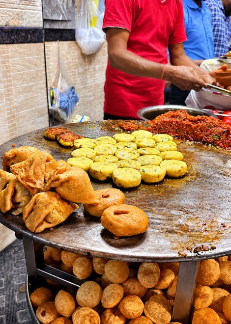 Kachori, tikki and golgappa piled high at the chaat stall.