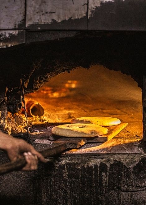 Moroccan khobz bread cooked in a communal oven