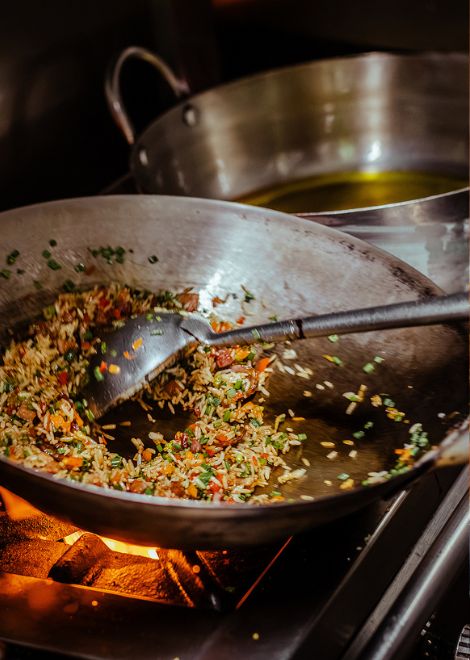 The sizzle of the wok, a defining sound of Lima's kitchens.