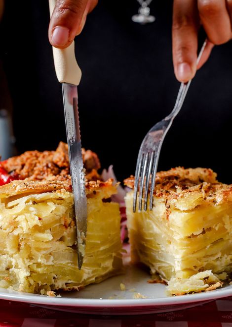 Layers of potato and rich filling come together in the classic pastel de papa.