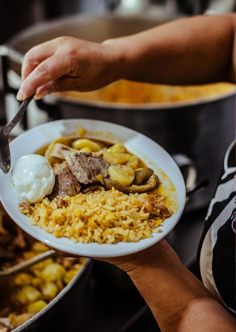 Tender pork and potatoes simmered in a rich, nutty papas con cuero.