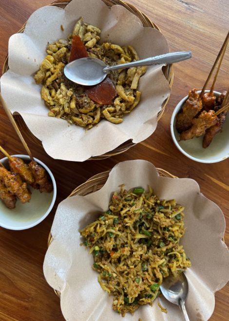 Bali's legendary babi guling served with lawar and a loaded nasi campur.