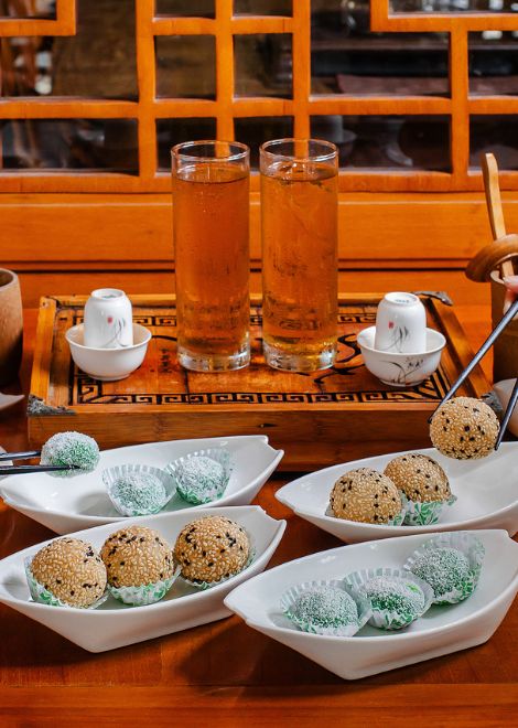 A classic Chinatown pairing: sesame-crusted onde-onde and jasmine tea.