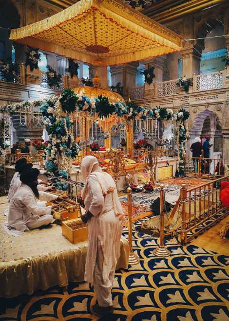 Visit an ornate Sikh temple and their giant kitchen