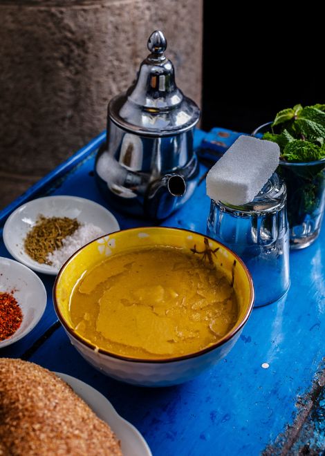 Soothing bissara fava bean soup with olive oil and cumin