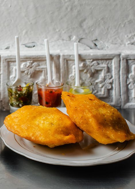 Golden pastel de pollo, a flaky Colombian pastry filled with savoury chicken.