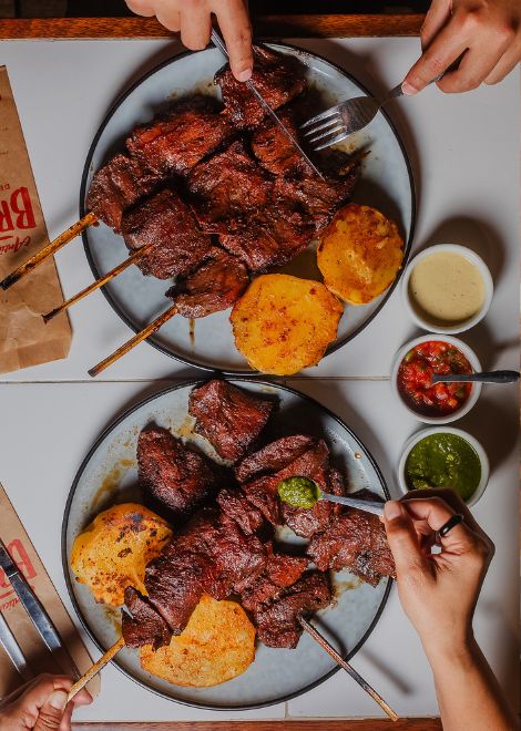 Experience Lima's evening food scene with 14+ local specialities.