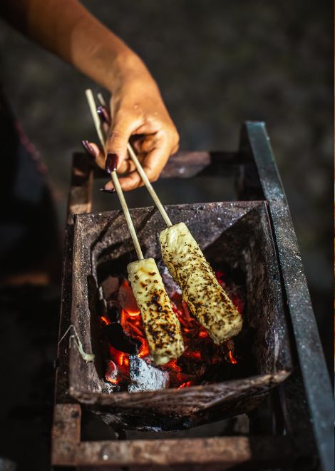 Queijo coalho cheese grilled over hot charcoal