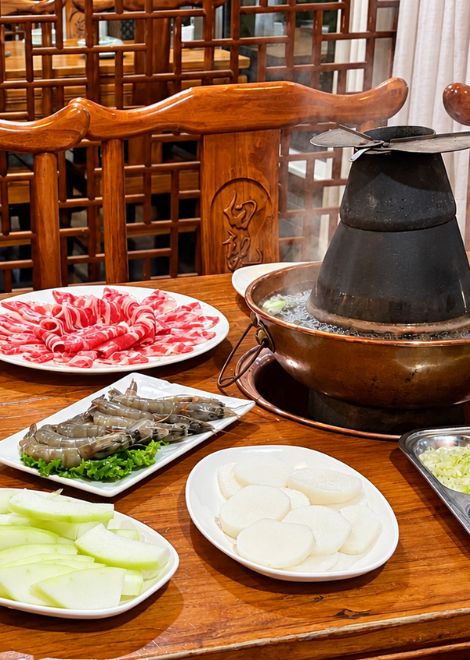 Taste your way through Niujie with 19 tastings, from cumin-dusted lamb skewers to copper pot hotpot.