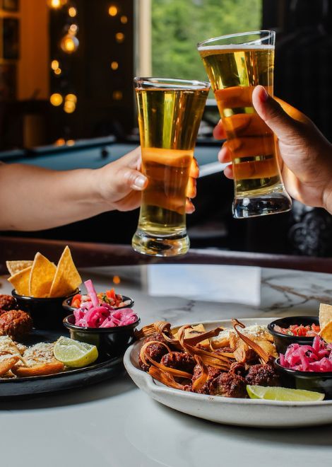 A Salvadoran pairing of local Pilsener and traditional chorizo de tusa.