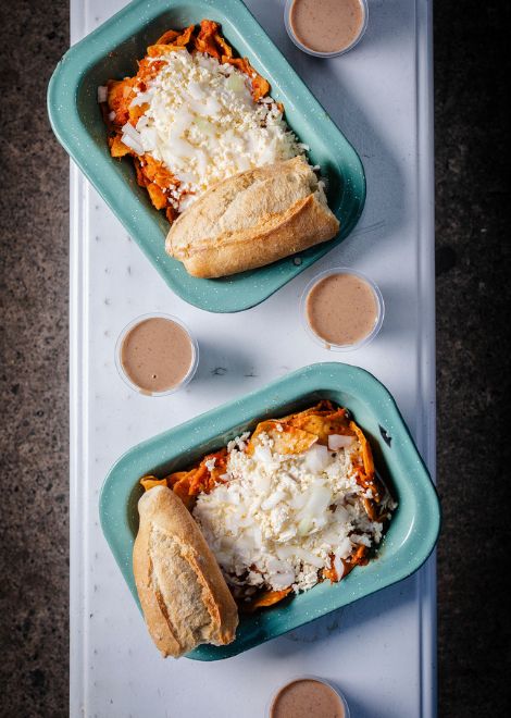 Chilaquiles rojos, crispy tortilla chips in a piquant tomato sauce