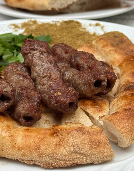 Piyaz's partner in crime, şiş köfte, fingers of skewered and spiced meatballs 