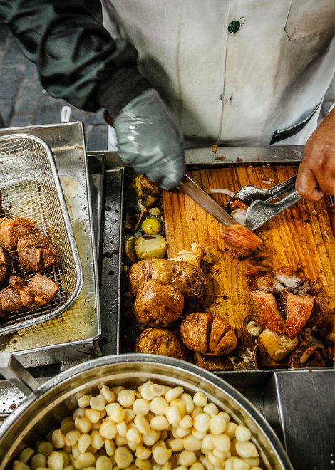Succulent fried pork with crisp crackling, served the Peruvian way.